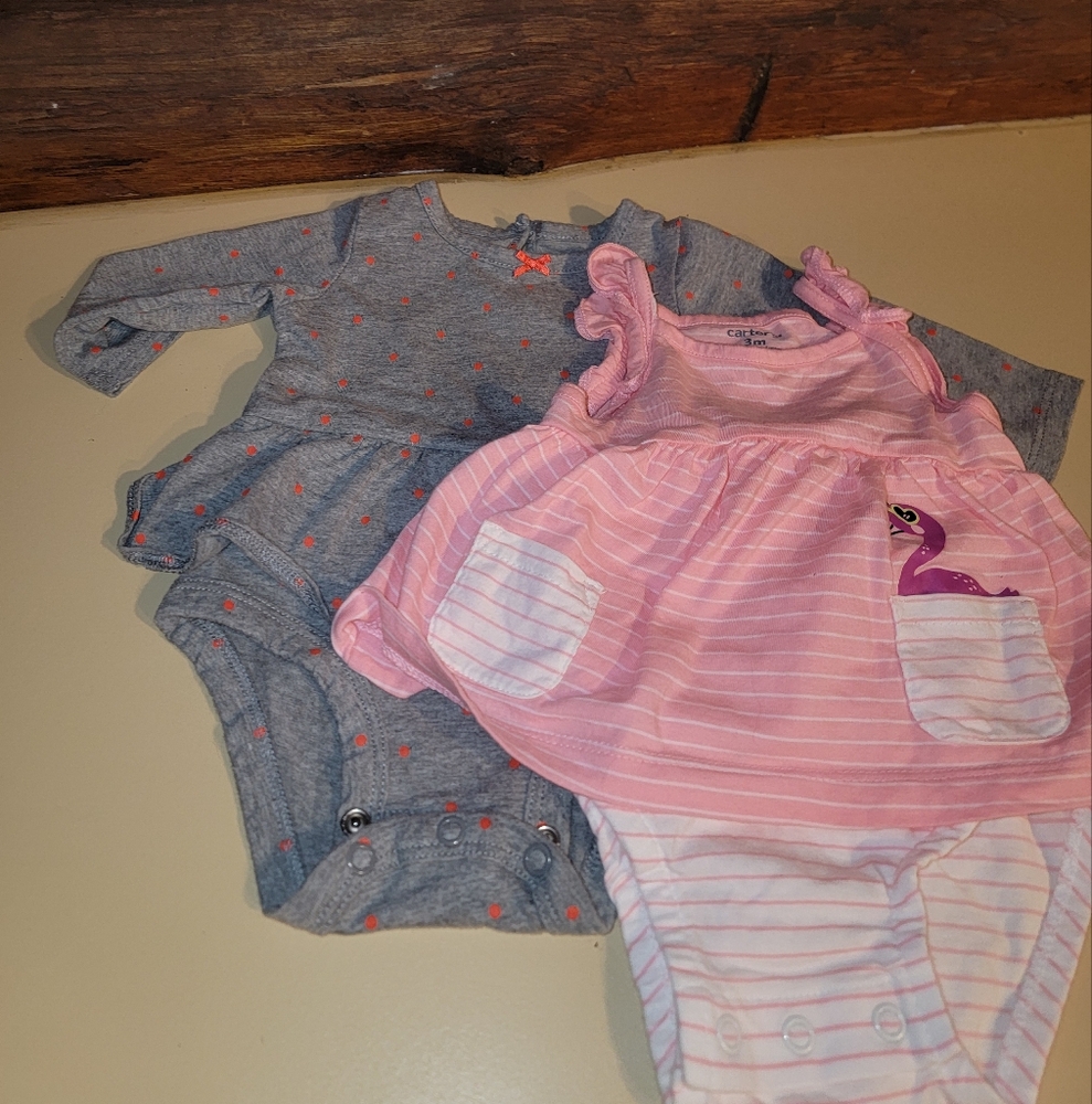 Carter's 2 bundle cute rompers. Like new!